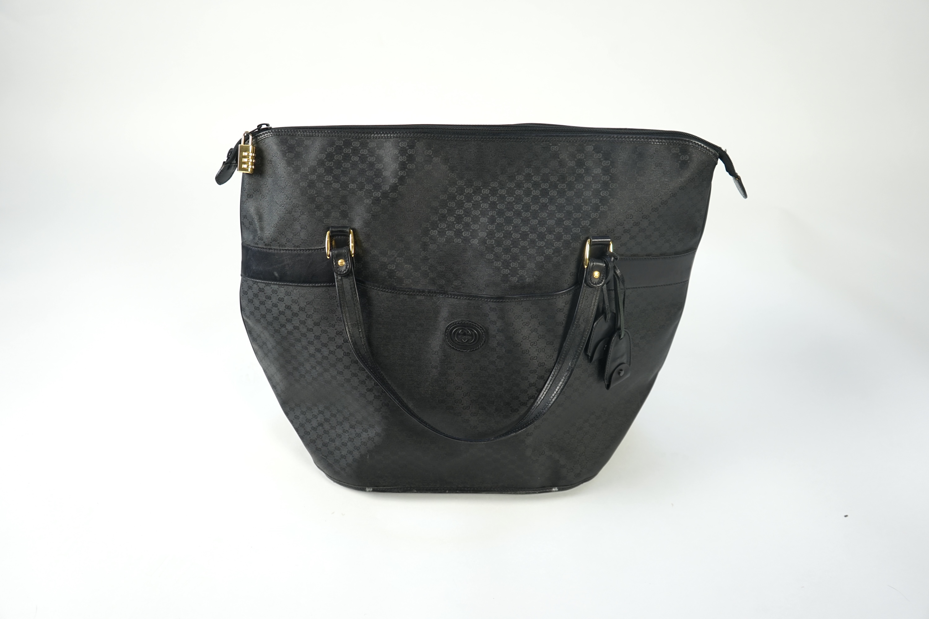 A large Gucci GG monogram black nylon shopper bag